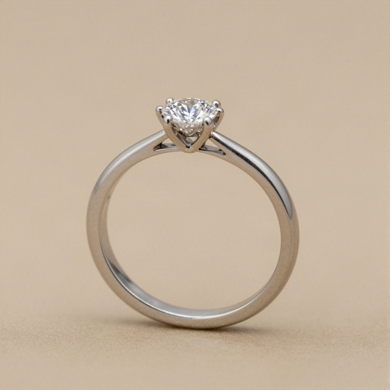 A white gold engagement ring with a round diamond solitaire